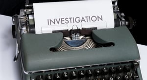 Useful information on the mandatory whistleblowing channel - typewriter with ongoing investigation