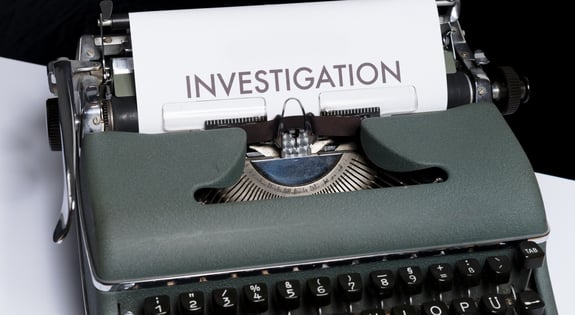 Useful information on the mandatory whistleblowing channel - typewriter with ongoing investigation